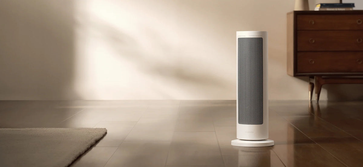 Xiaomi Smart Graphene Heater op een houten vloer in het zonlicht