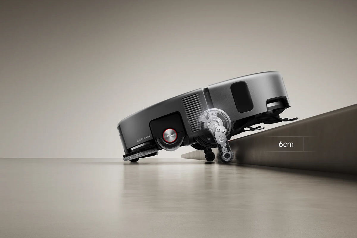 Xiaomi Robot Vacuum 6 Max klimt met zijn klimpoten over een drempel van 6 cm