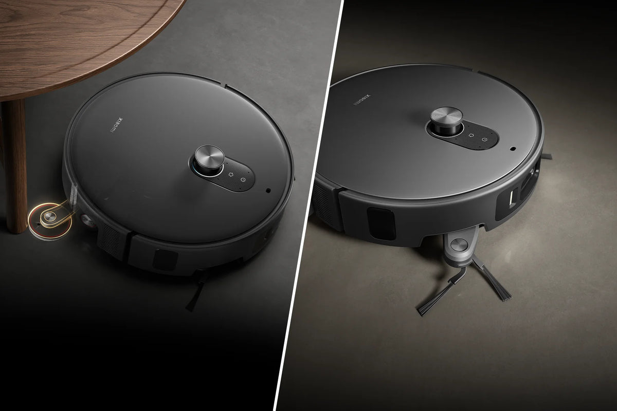 Xiaomi Robot Vacuum 6 Max met uitgeschoven hoekmop langs een tafelpoot en uitgeschoven zijborstel